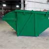 Side view of a K-PAC industrial & commercial solid waste compactor