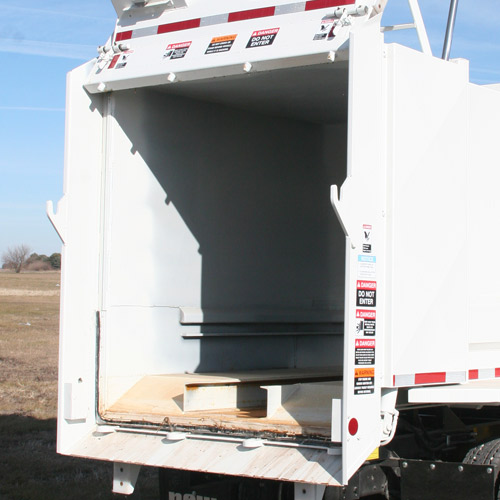 The New Way Mamba Satellite Loader's design allows you to keep your truck a work area for easy transport to the landfill.